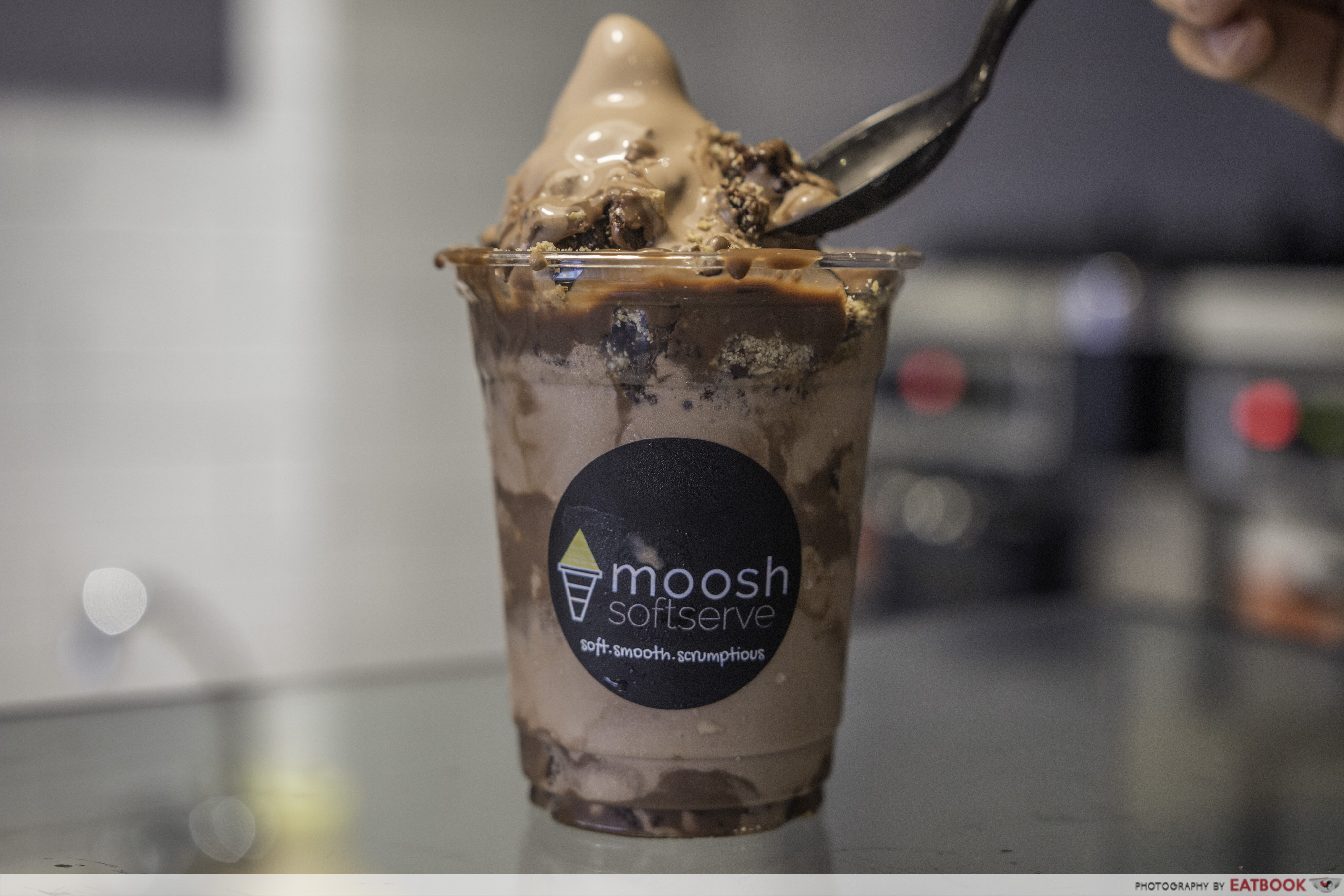 Moosh - Nutella Brownie Cheesecake Soft Serve scooping