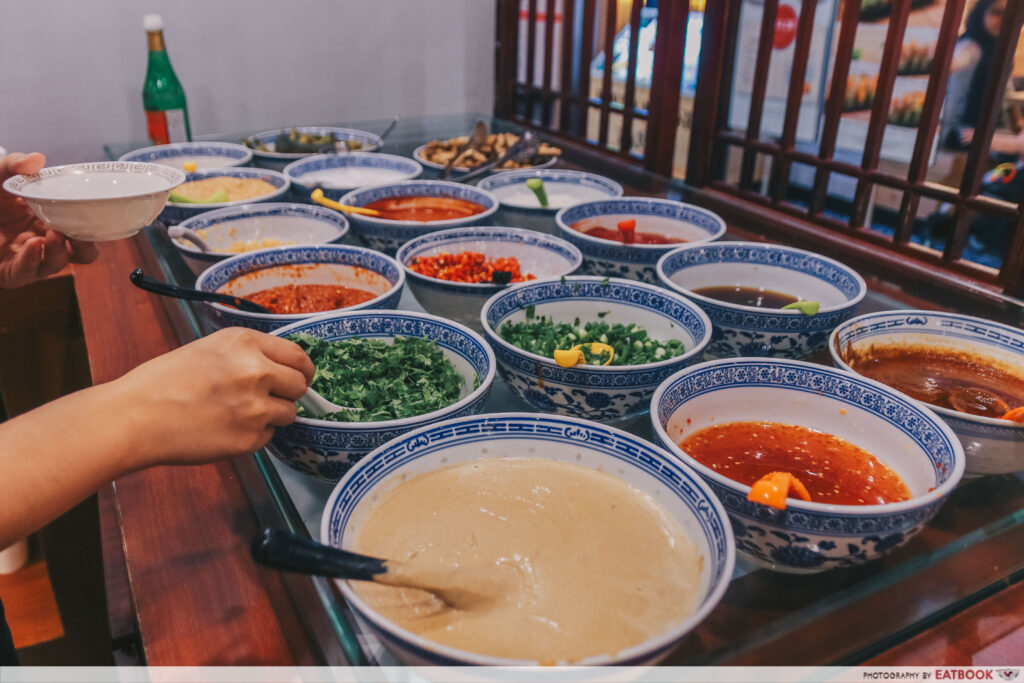 yi qian ling yi ye steamboat buffet - condiments bar