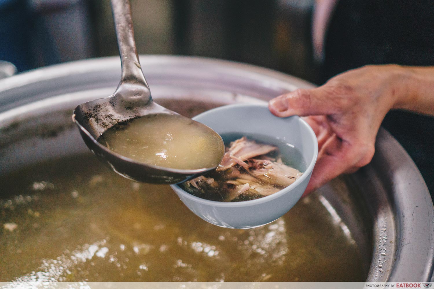 Victor Fried Chicken Wing RIce - chicken bones in soup