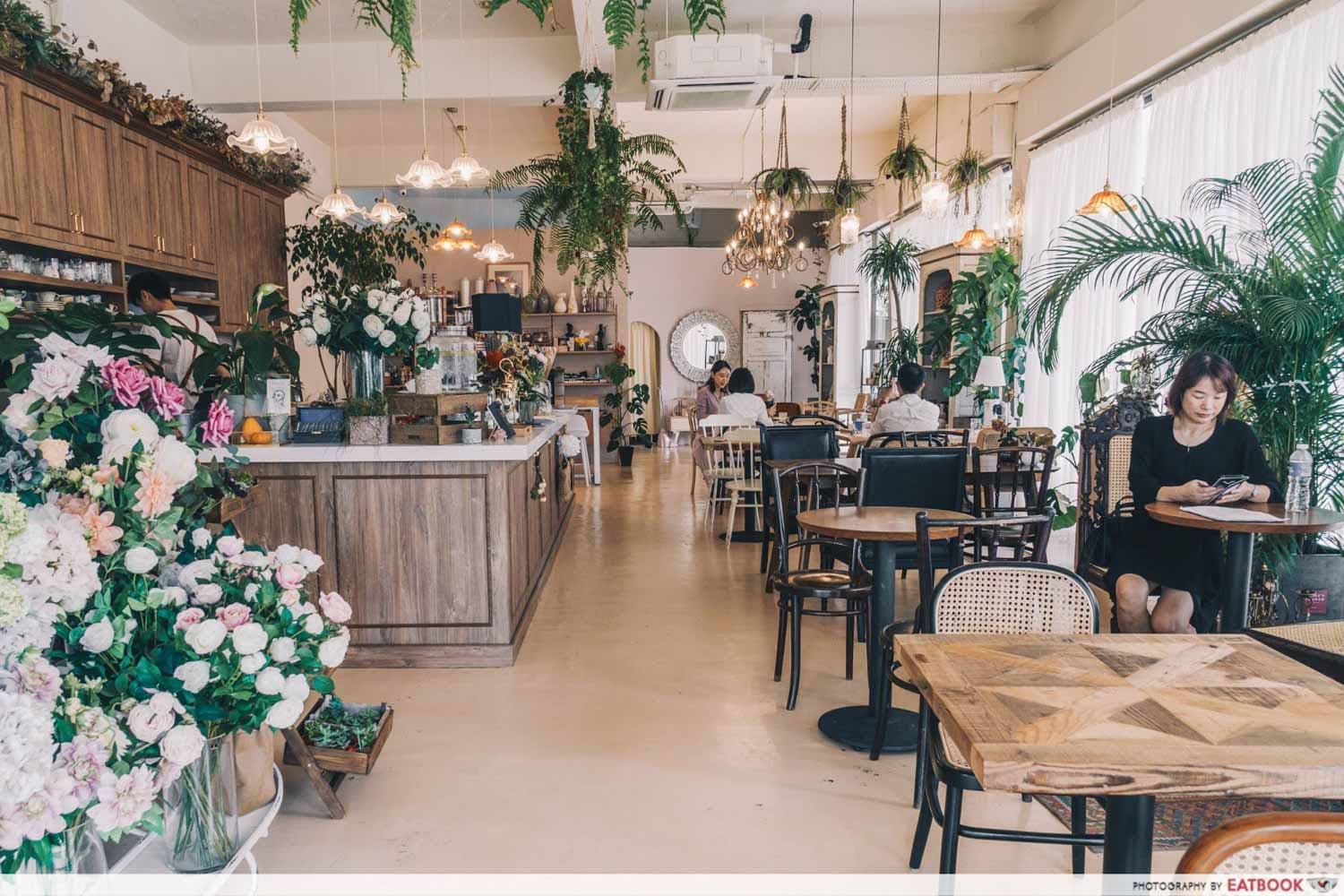 12 New Restaurants June - Cafe de Nicole's flower ambience