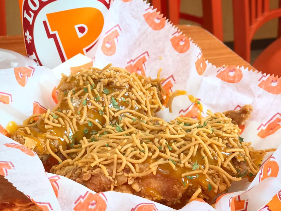 Popeyes Has A New Fried Chicken Topped With Curry And Noodles