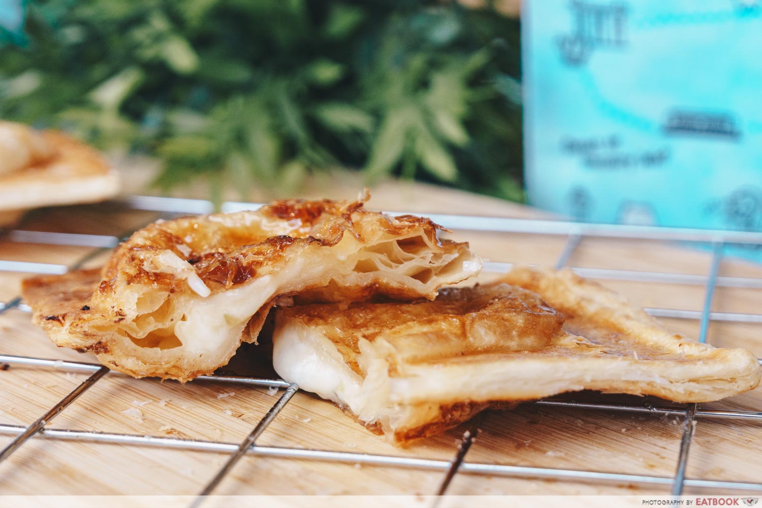 Soe Tam Jiak - cheese taiyaki cut in half