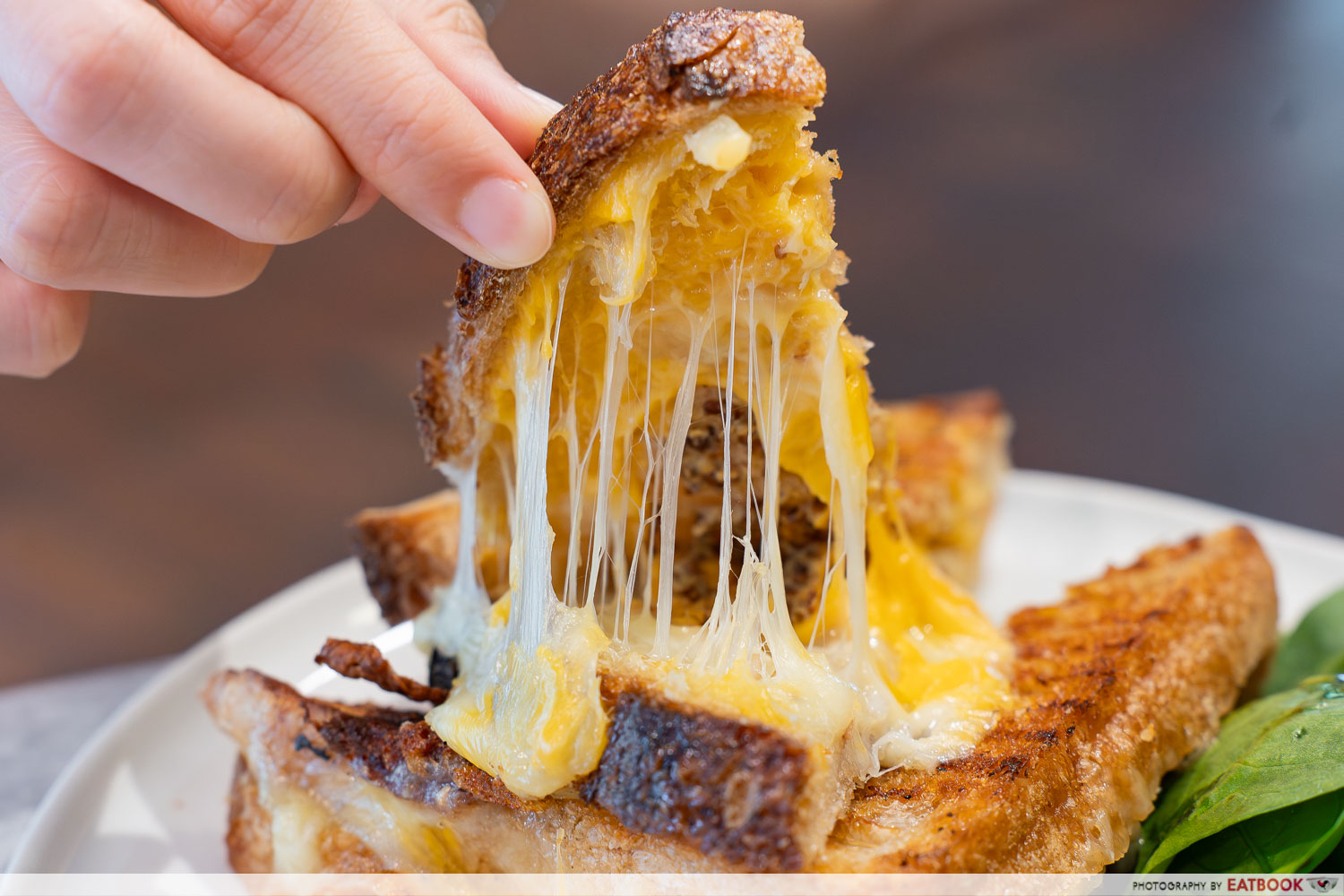 cheese pull interaction shot