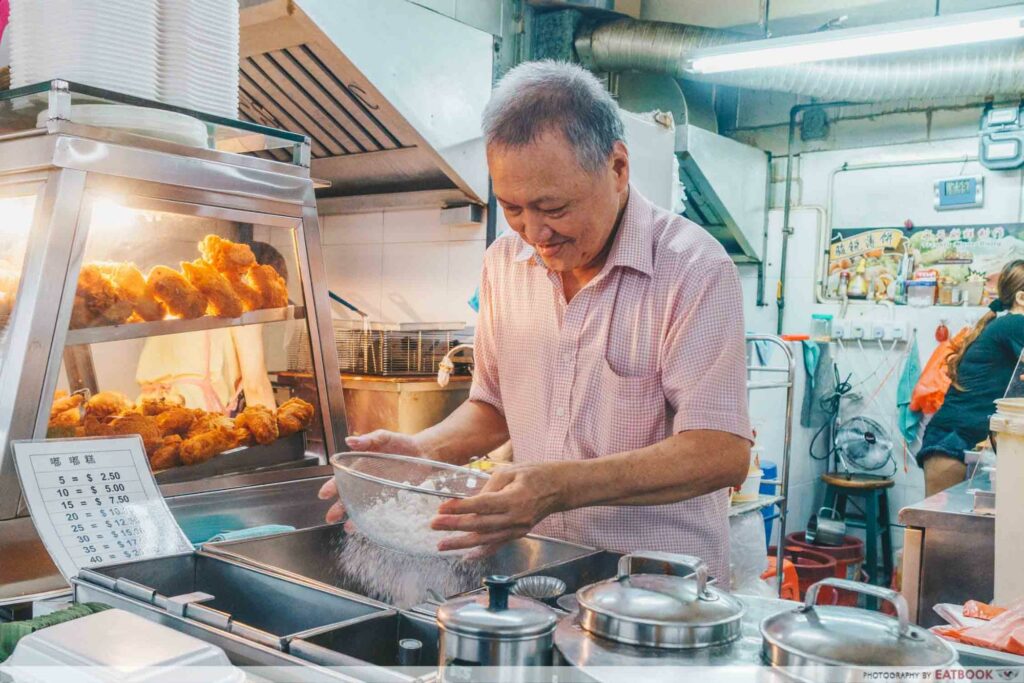 Mr Ho sifting flour