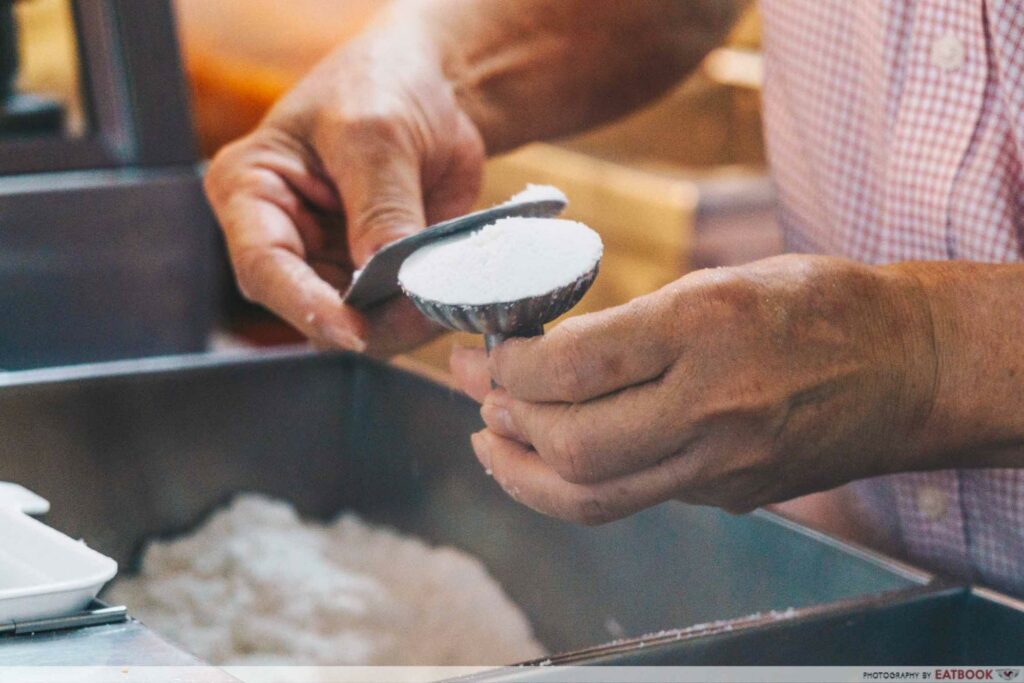 Mr Ho Tutu Kueh scooping