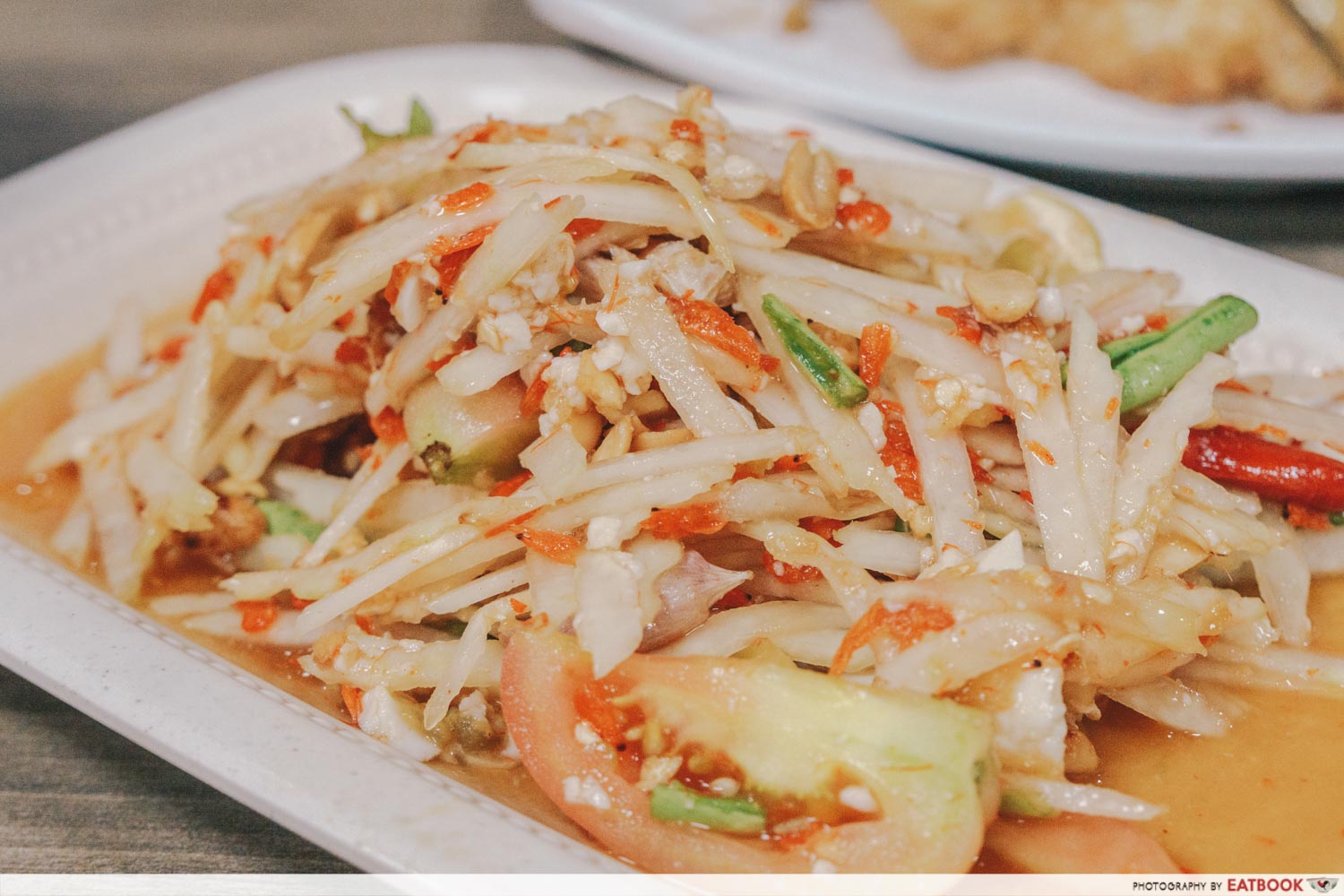 Underrated Thai Dishes som tum kai kem papaya salad with salted egg