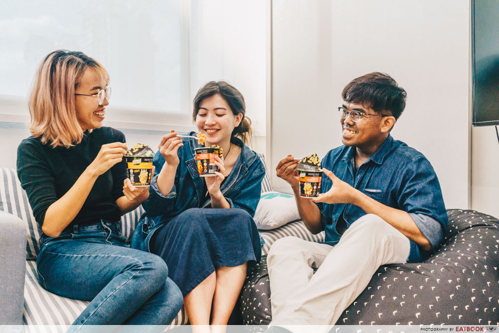 Friends eating pasta