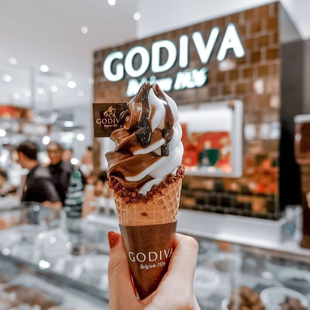 Godiva soft serve in front of shop