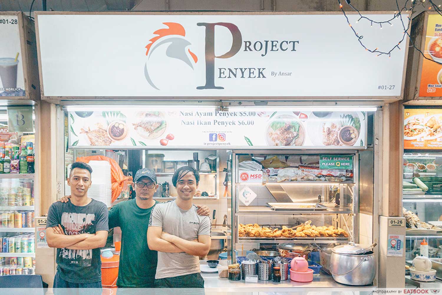 Project Penyek-Storefront shot with owners