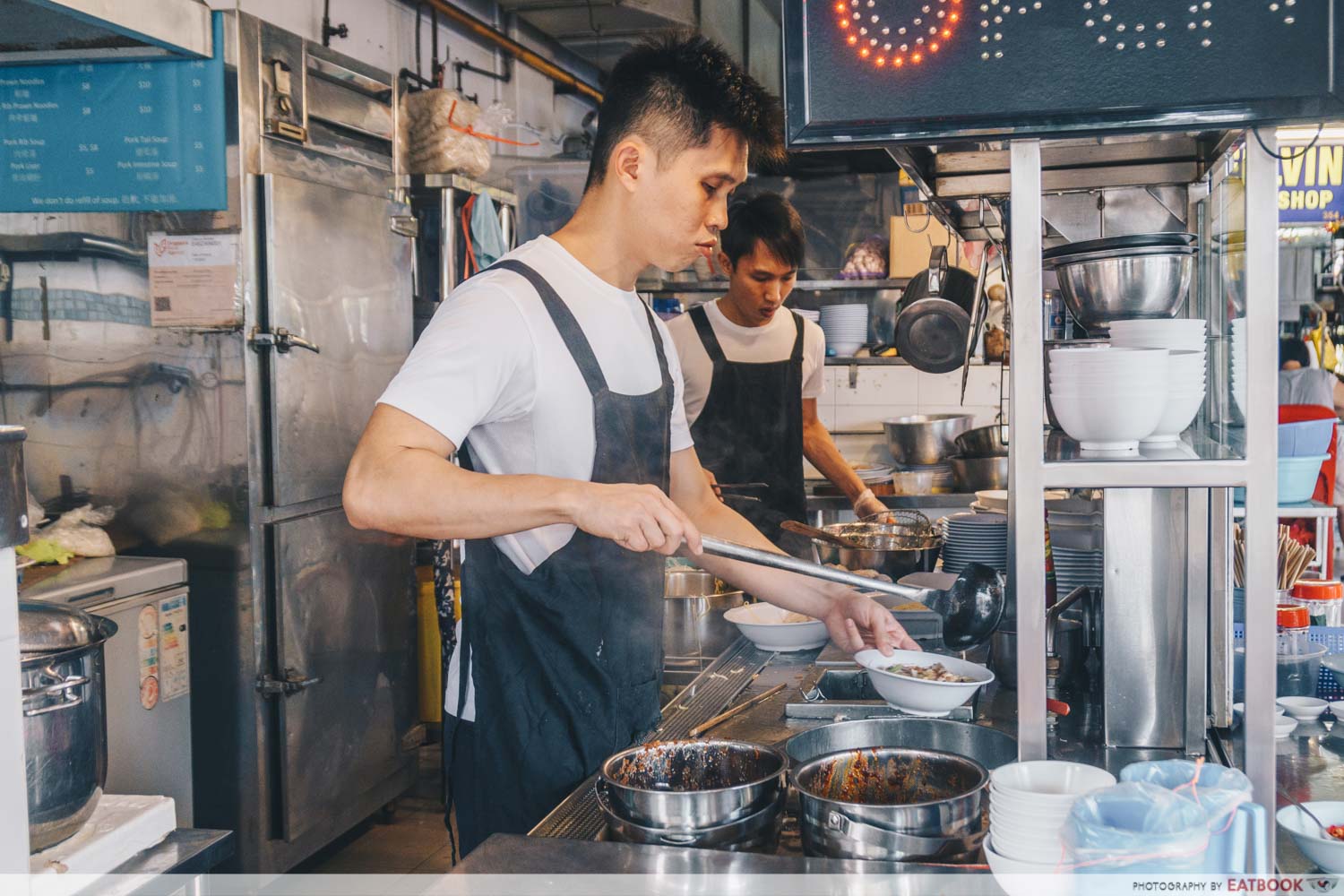 Da Dong Prawn Noodles - Owner cooking shot