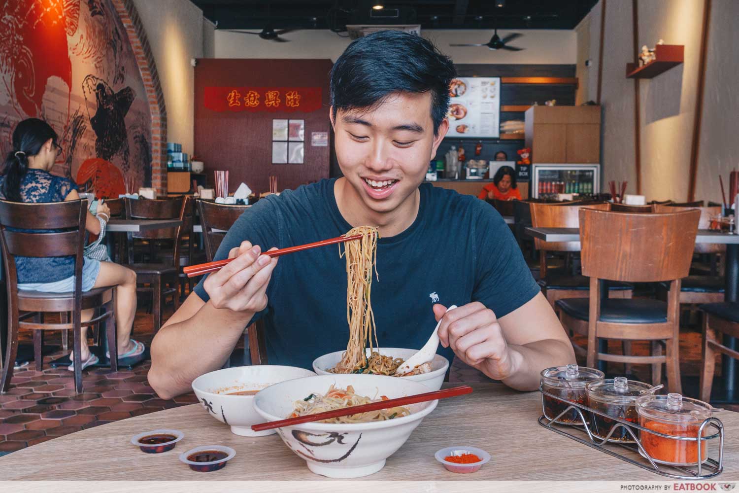 East Treasure Speciality Prawn Noodles - Eating shot