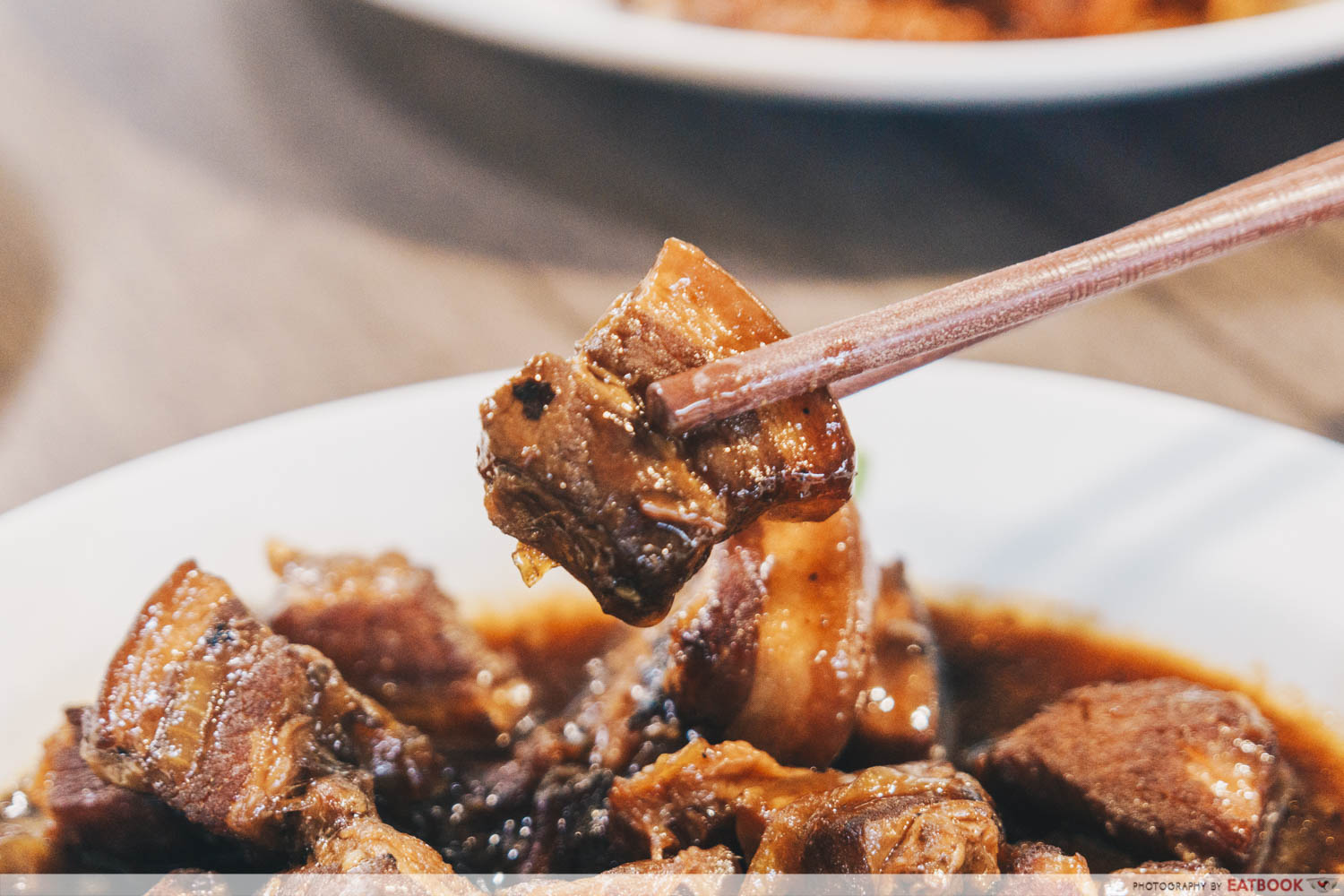 Emmanuel Peranakan Cuisine - Pork belly on chopsticks