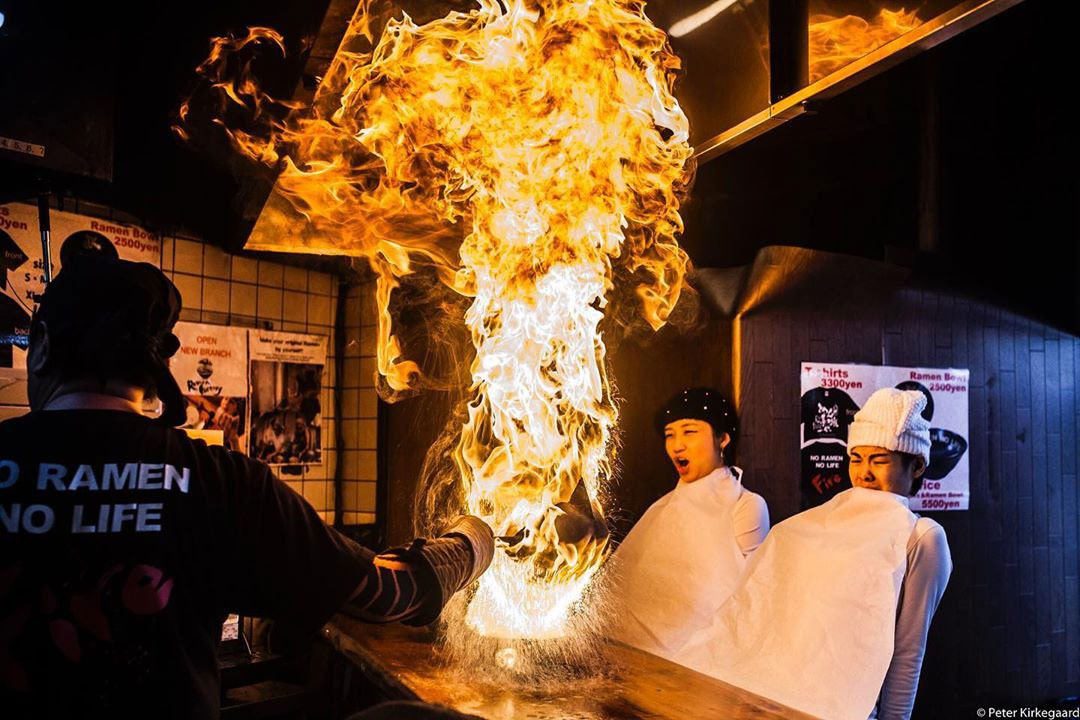 Menbaka Fire Ramen - Ramen on fire in front of diners