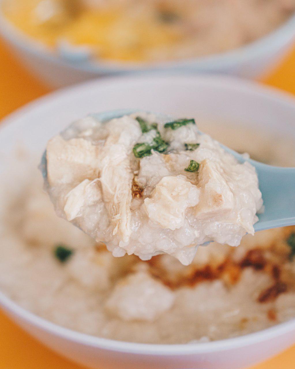 Spoonful of chicken and porridge