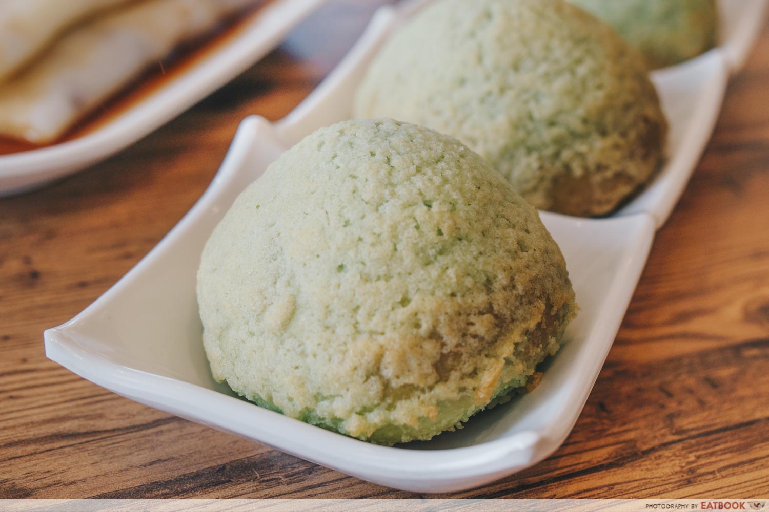 Sum Dim Sum - Pandan crispy pork buns closeup