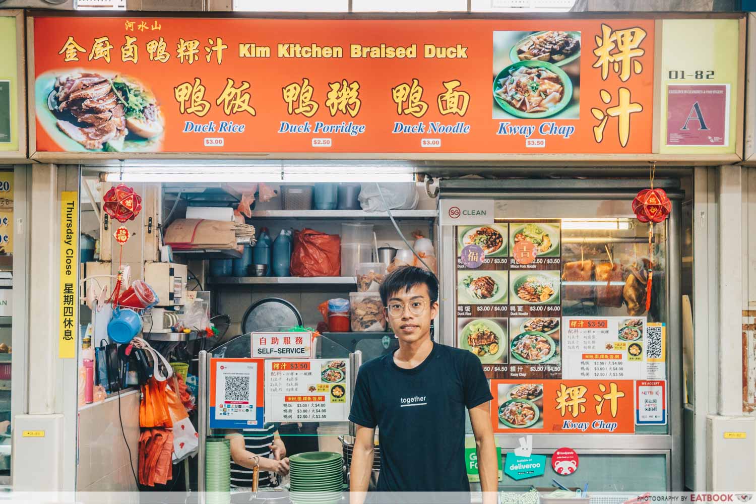 Kim Kitchen Braised Duck - Storefront shot with owner