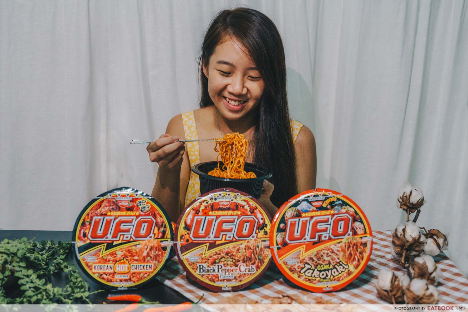 girl eating noodles