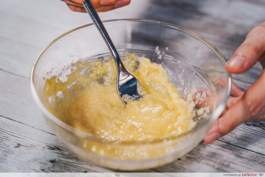 One-Pan Sriracha Pasta cheese sauce pour