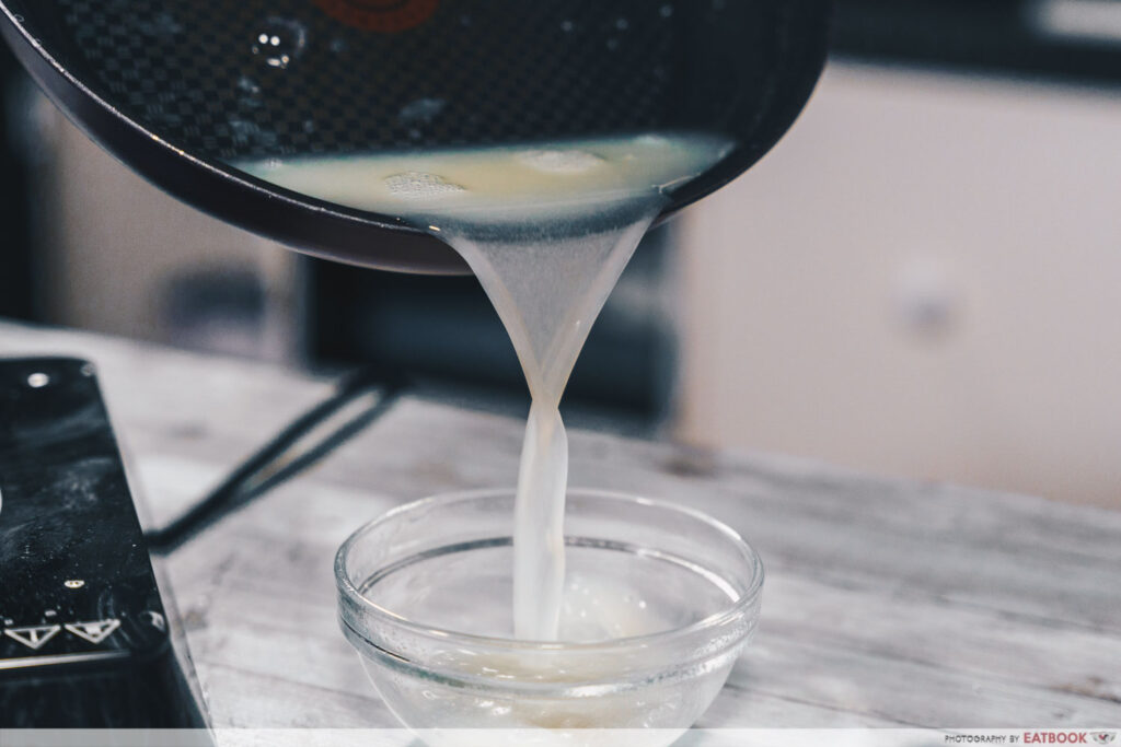 One-Pan Sriracha Pasta pour pasta water