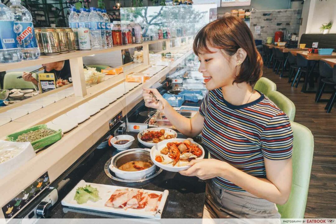 Ma Ma Spin Pot Review GardenThemed Conveyor Belt Hot Pot At Woodlands