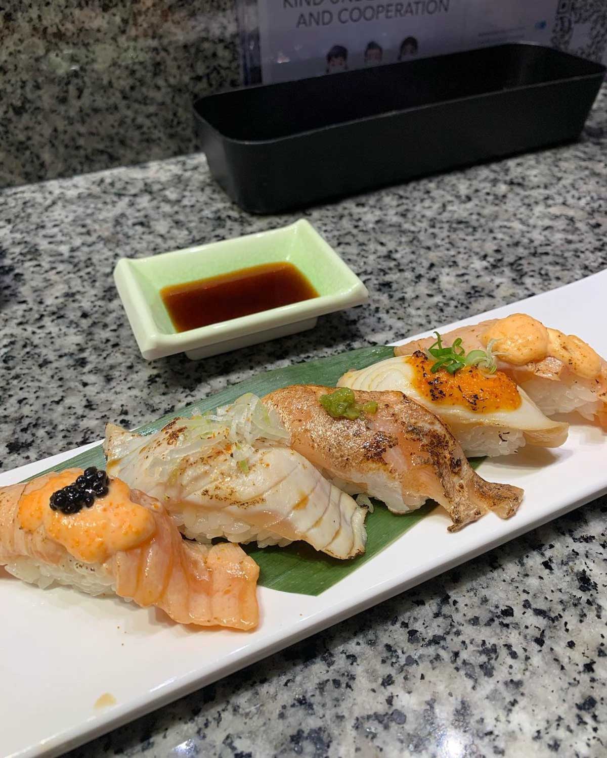 itacho sushi 1-for-1 - autumn roasted salmon and bincho tuna delights