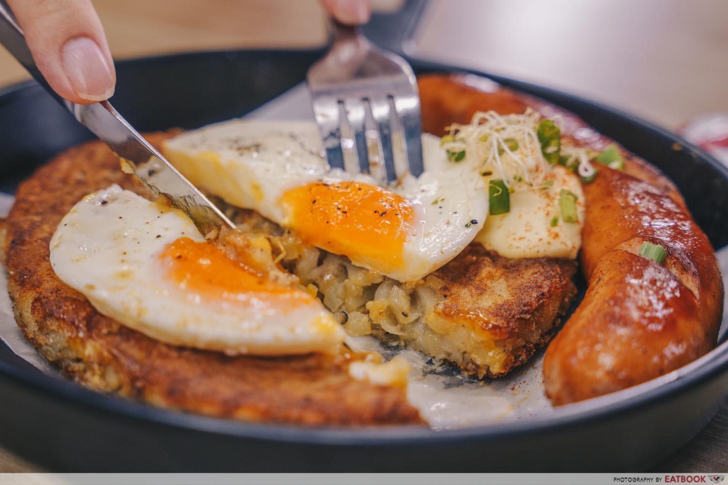 the breakfast club rosti with sausage and egg