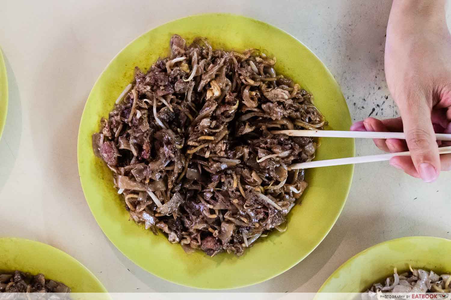 Cockles Fried Kway Teow - dark kway teow with chilli