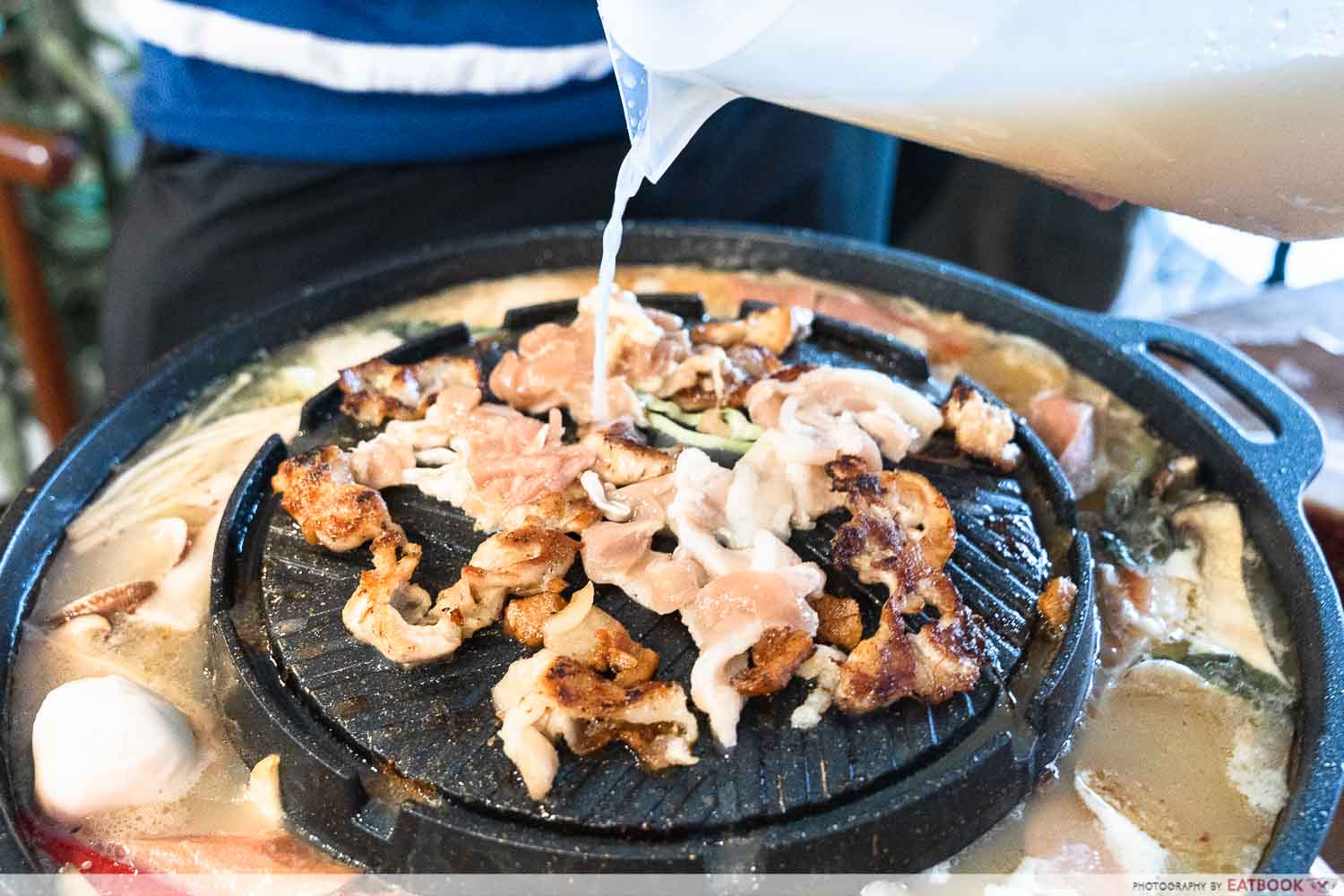 HAPPY POT POURING SOUP