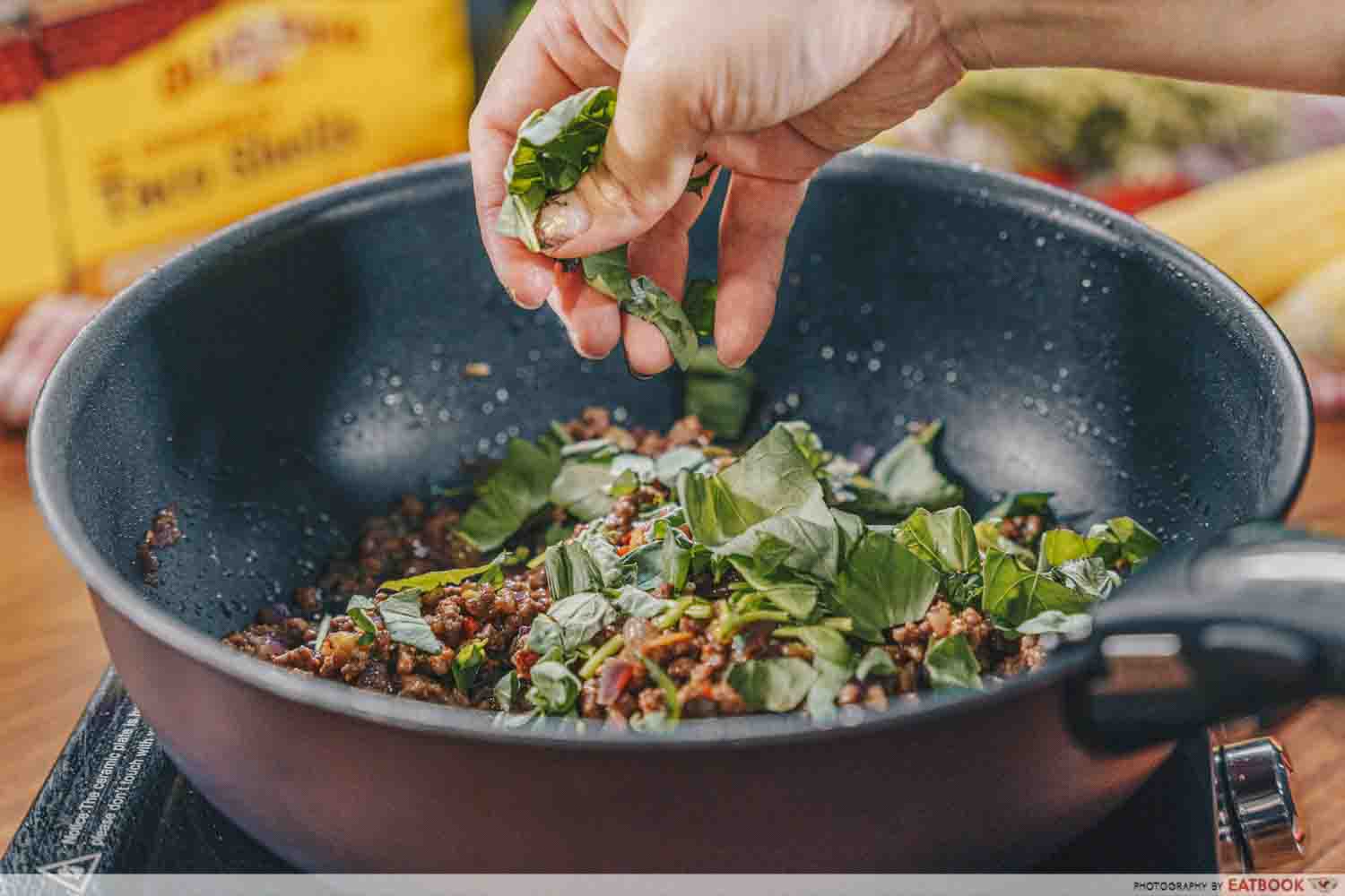 Old El Paso - adding basil to pad krapow