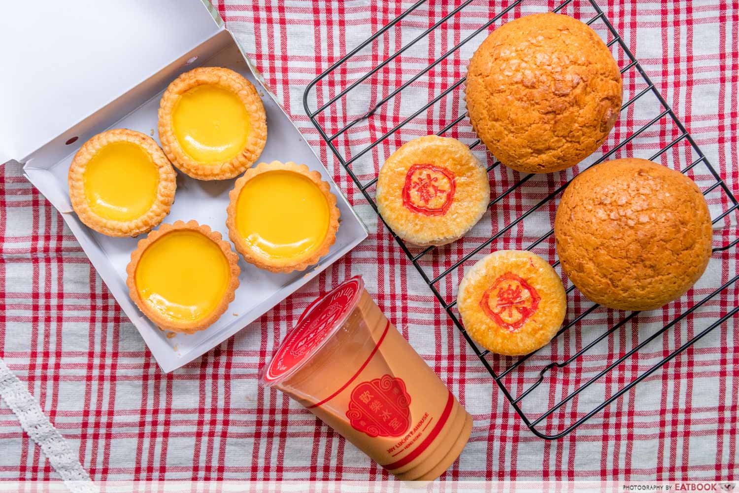 joy luck teahouse salted egg bolo bun flatlay