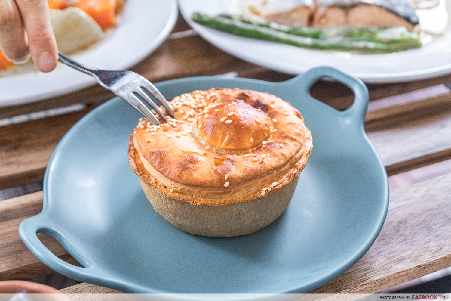 orange and teal beef pie