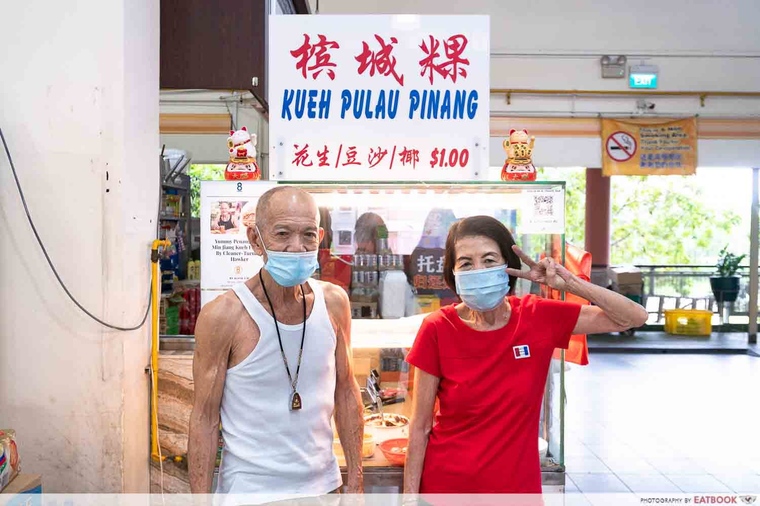 kueh pulau pinang storefront with owners 