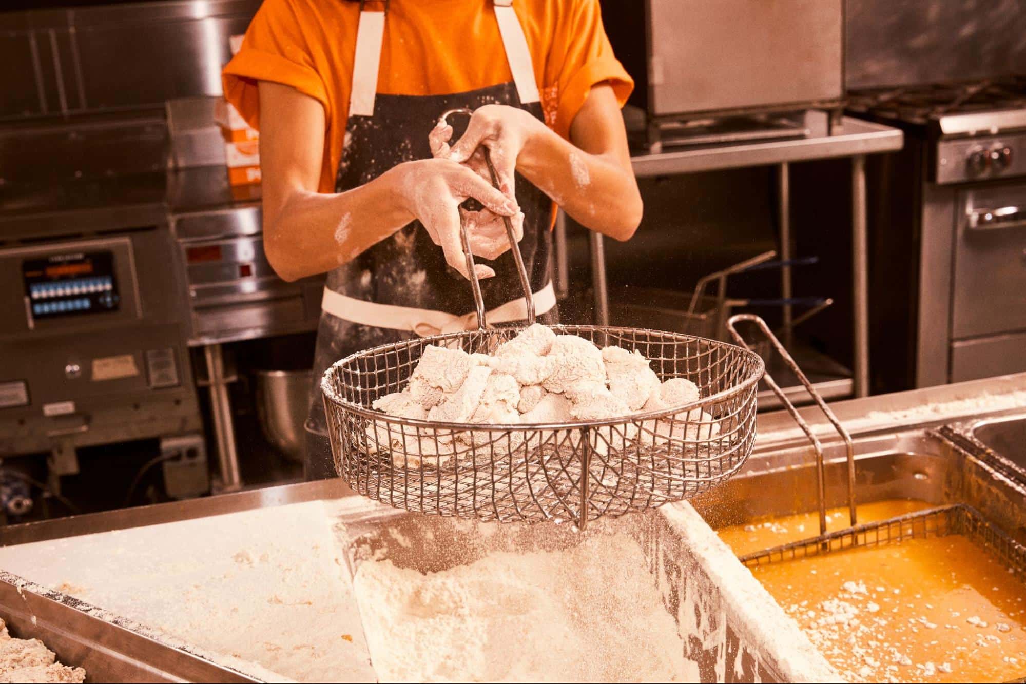 frying the chicken popeyes