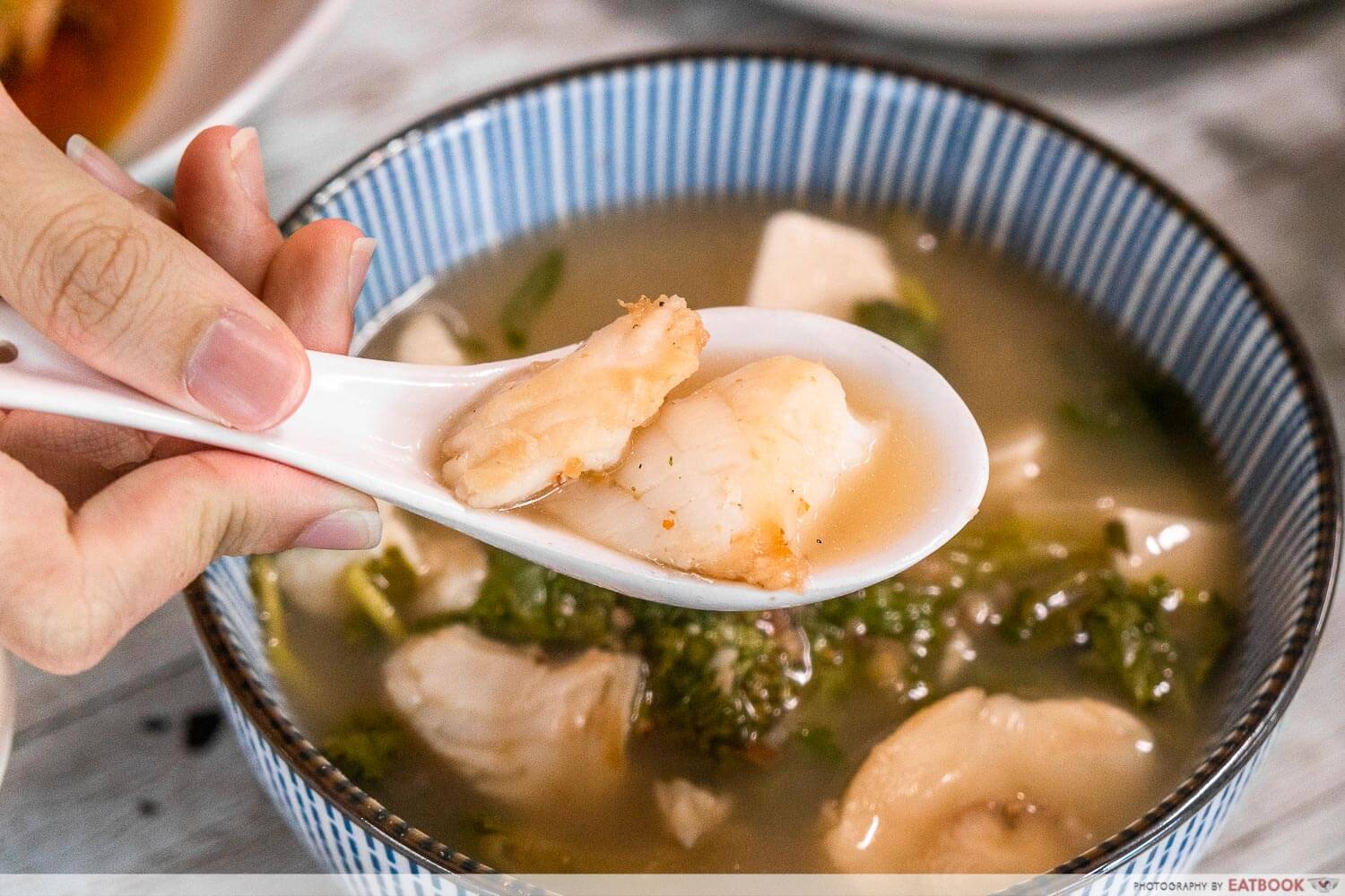 qing feng yuan - close up of new zealand cod fish soup