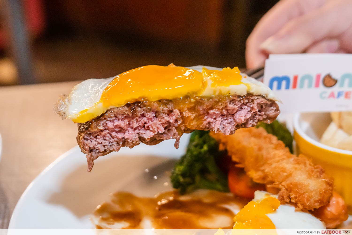 interaction shot of wagyu patty