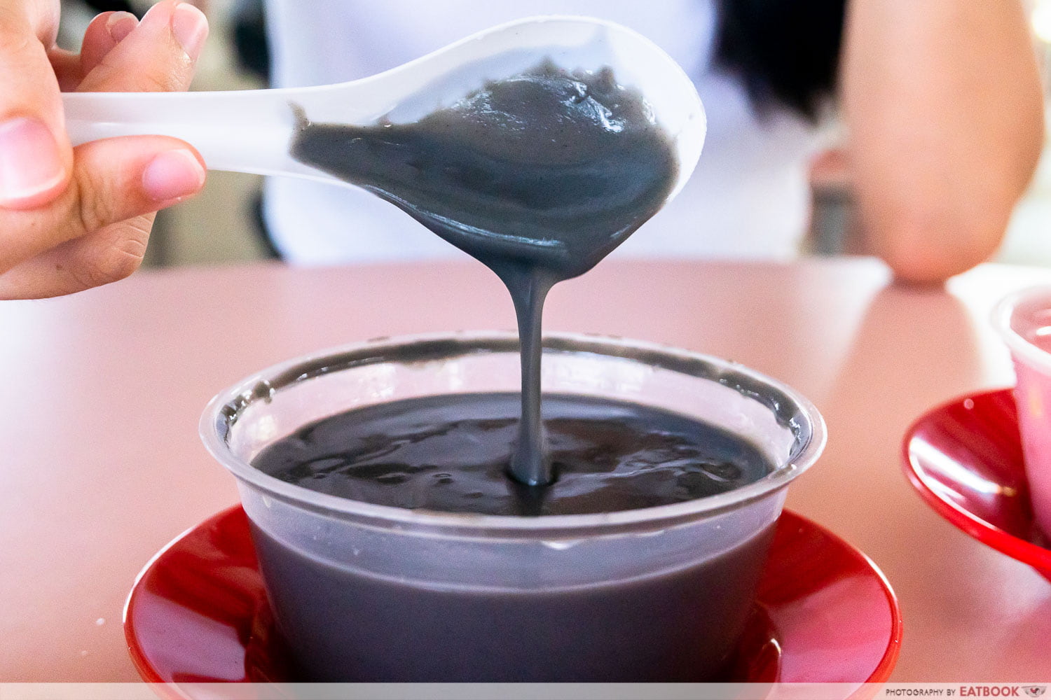 house of dessert - pouring shot of black sesame