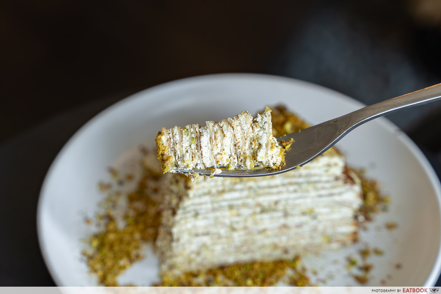 coexist-coffee-co-paya-lebar-pistachio-mille-crepe-fork-interaction