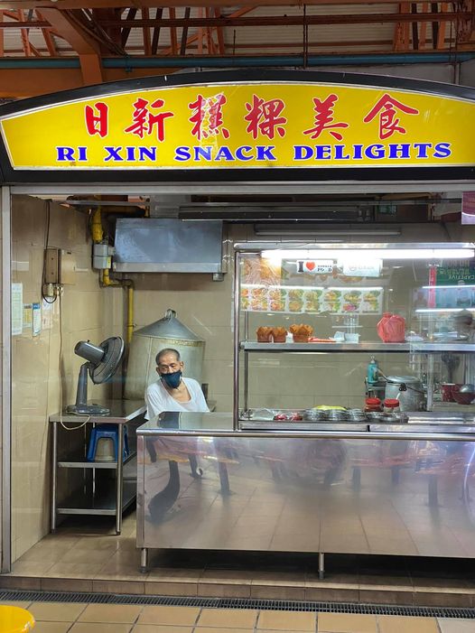 ri xin snack delights storefront and owner