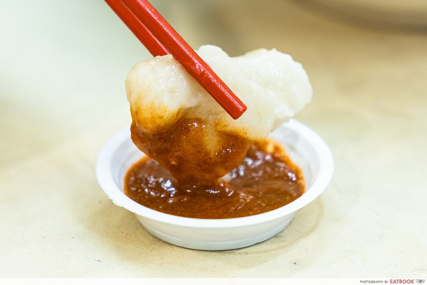 Mee hoon kueh in house-made chilli