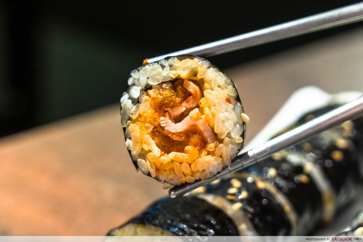 rolling rice bacon and kimchi roll intro shot