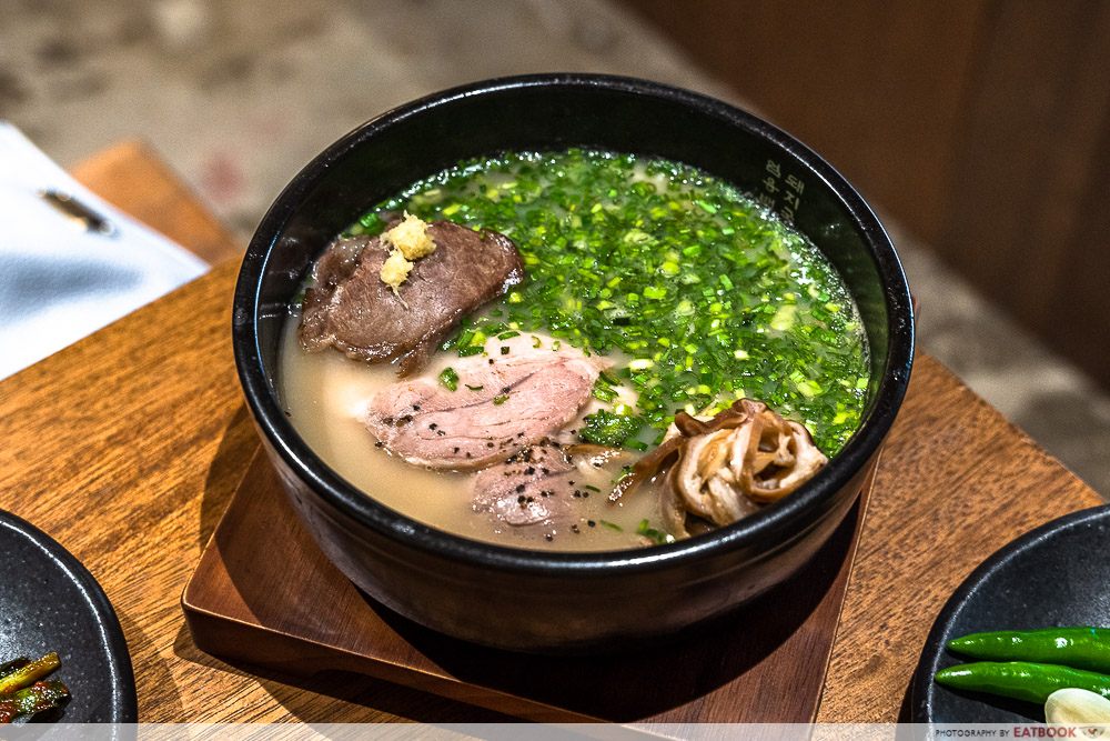 um yong baek pork rice soup chives