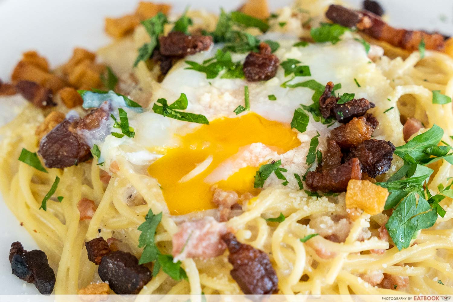 eightisfy western pork lard bacon carbonara egg close up