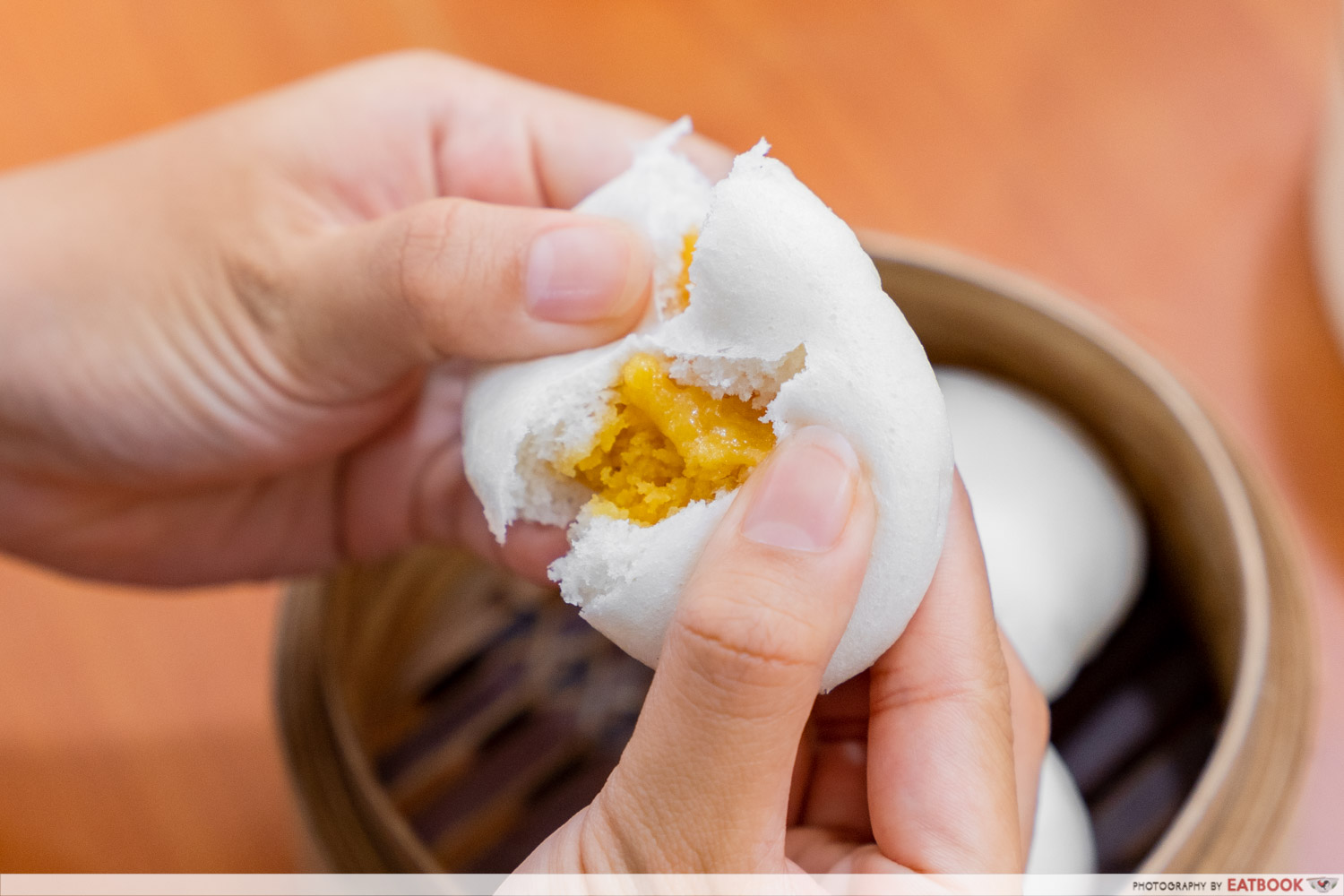 fantastic dim sum - lava custard bun tearing