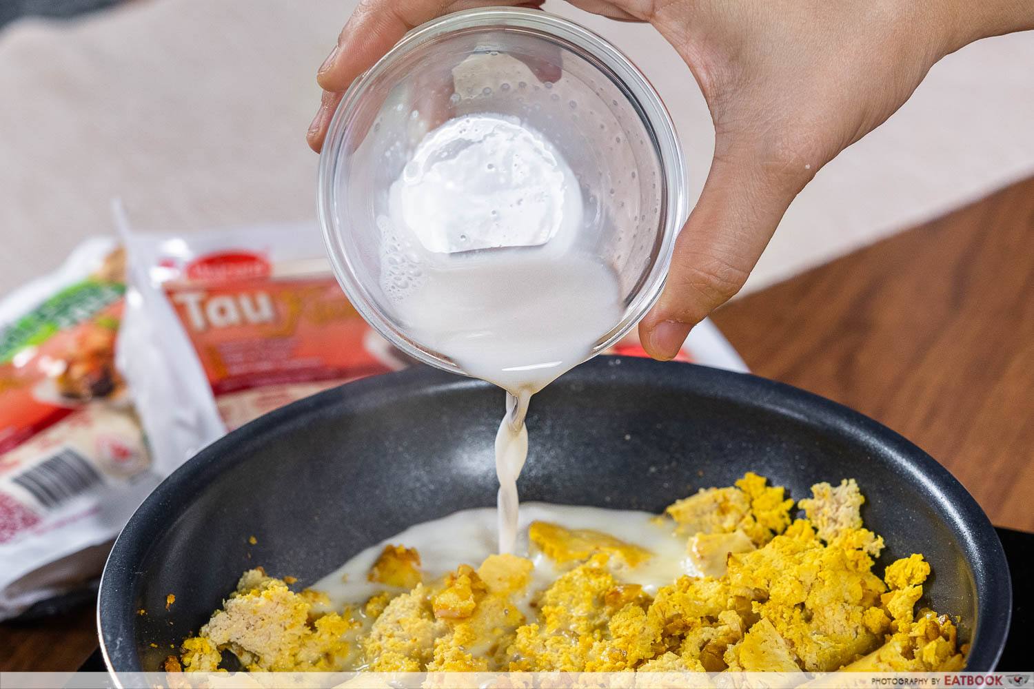 milk tofu scramble pouring