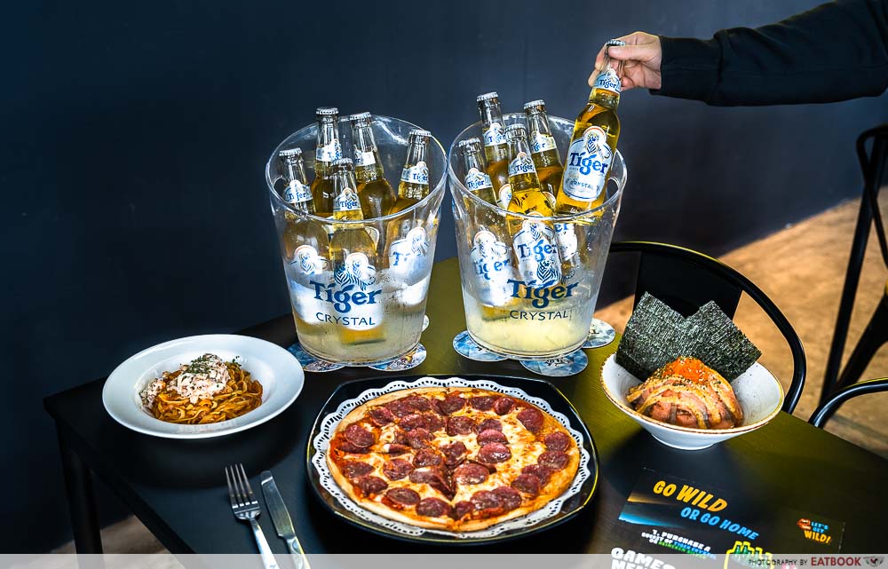 flatlay of beers and bar bites