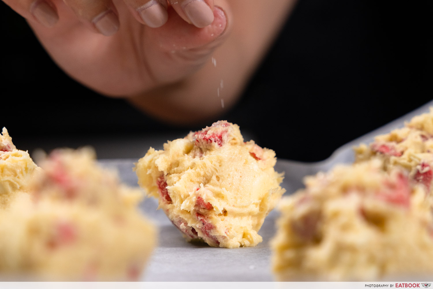 plucked freeze-dried fruit recipes - sprinkling salt on strawberries and cream cookies