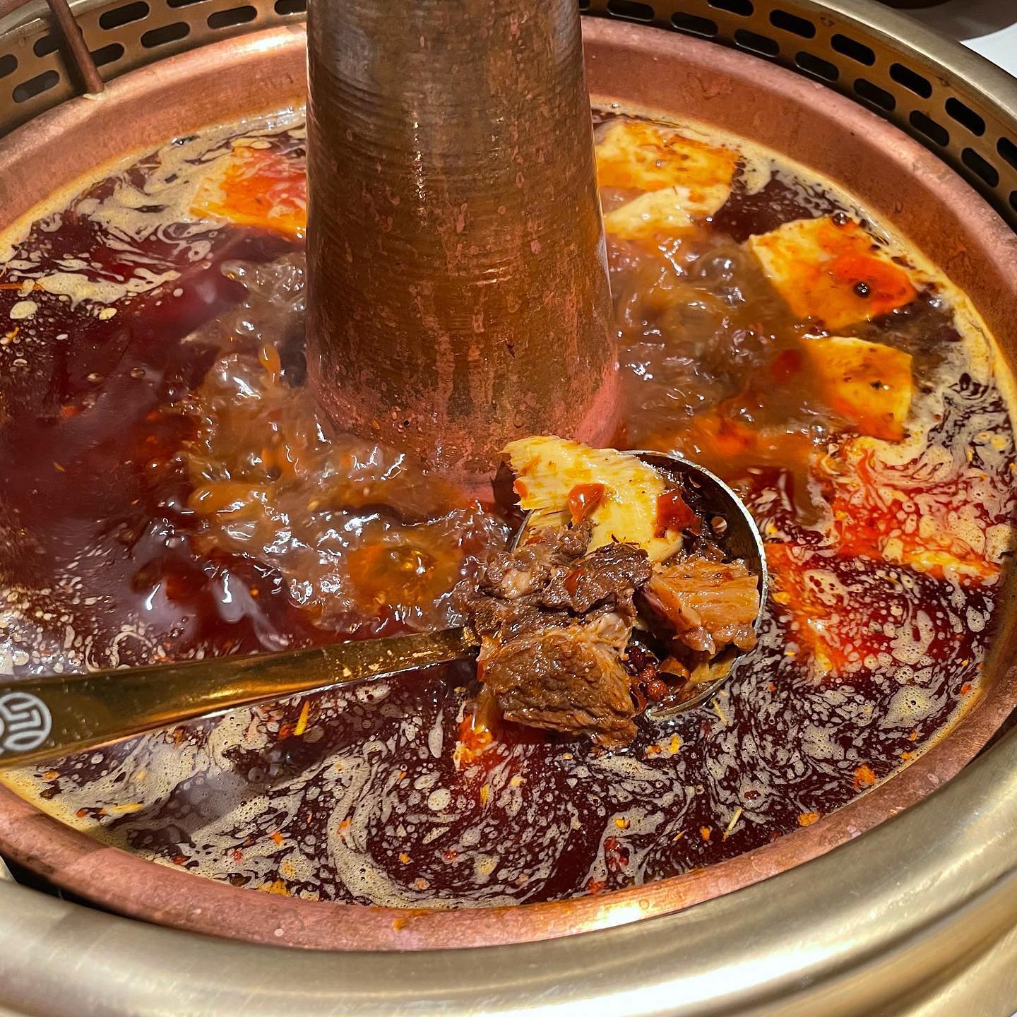 tong xin ru yi hotpot - stewed marinated beef in spicy soup