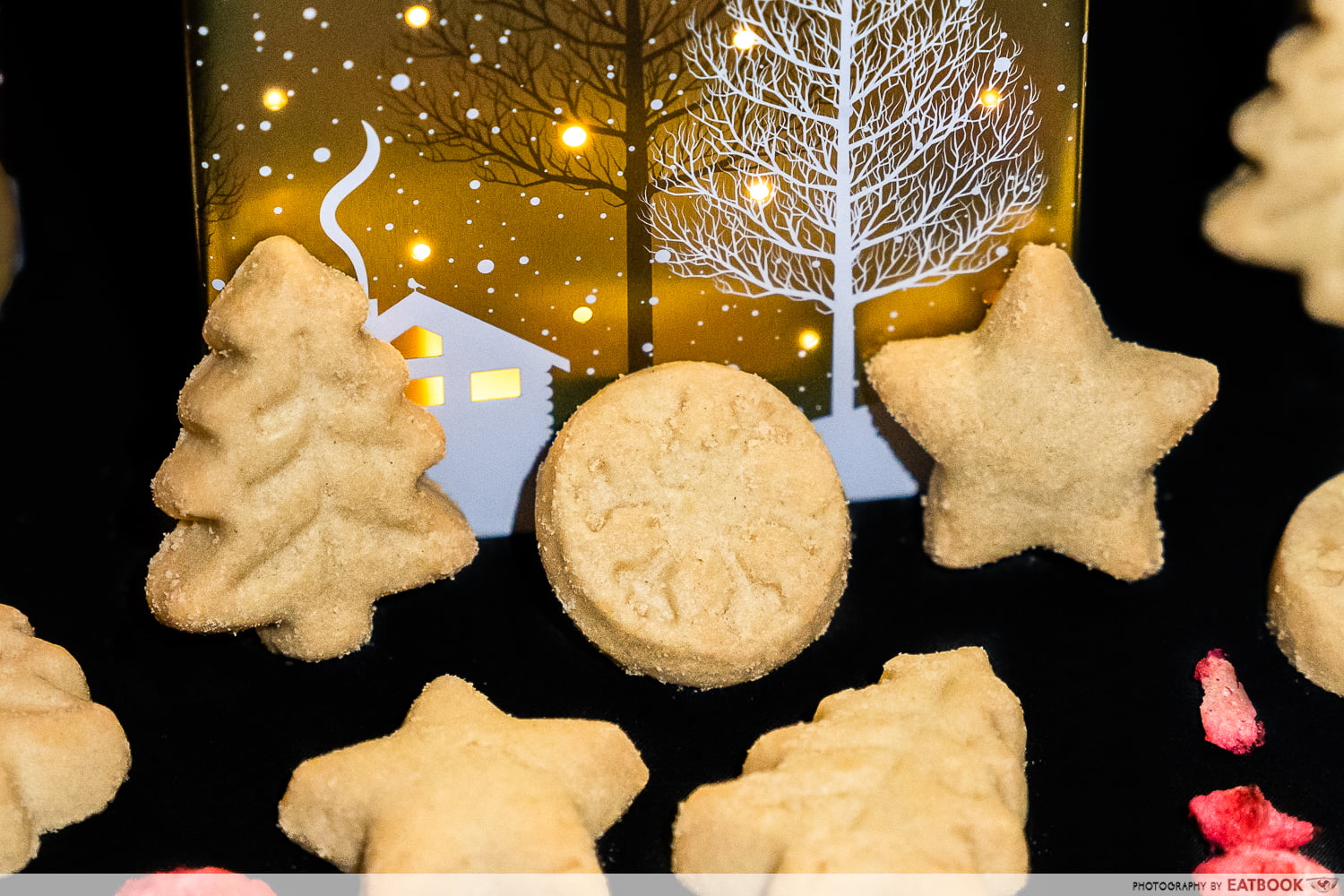 The £10 M&S christmas biscuit tin with a light projector and music on