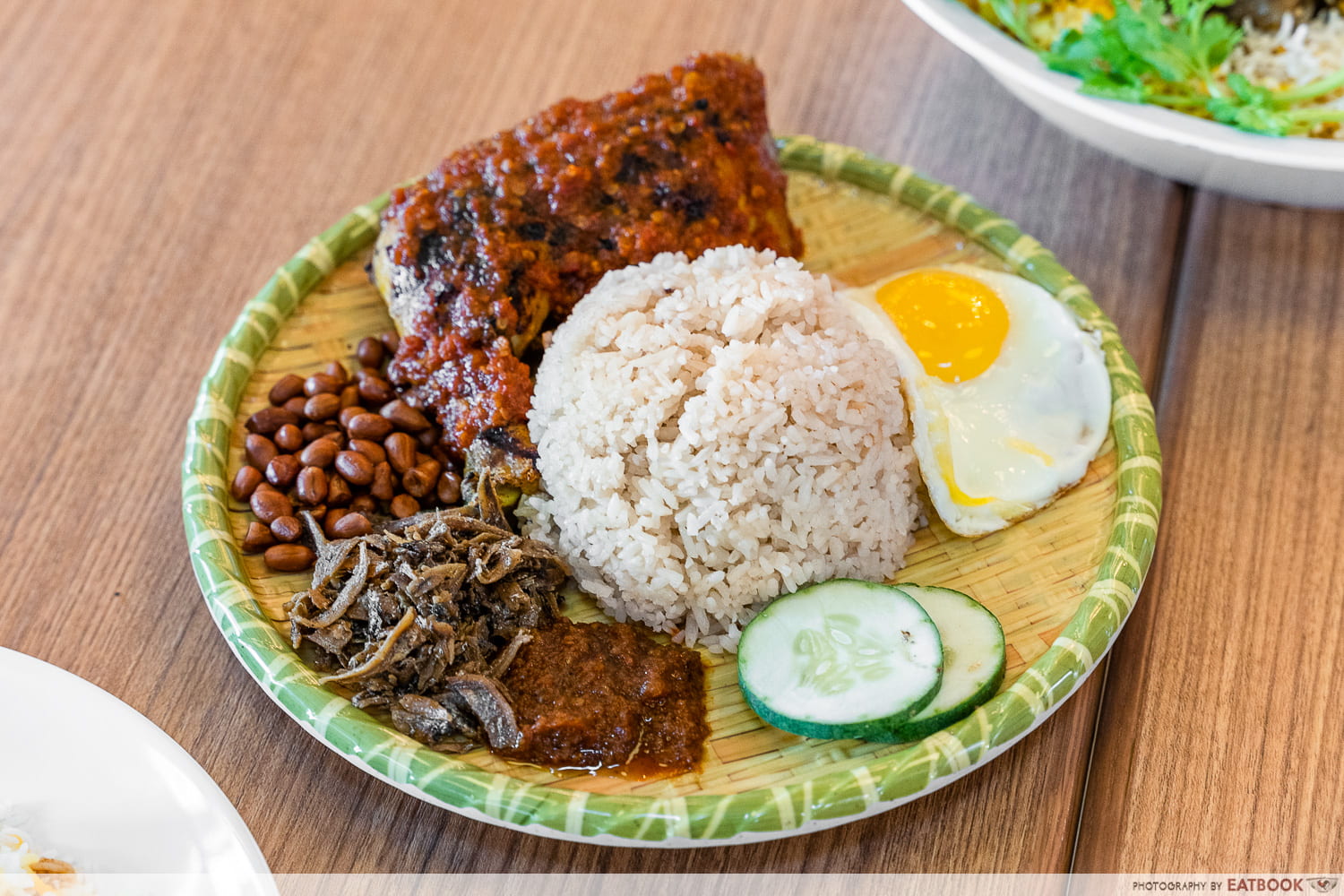 jurassic nest gbtb - nasi lemak ayam taliwang dish