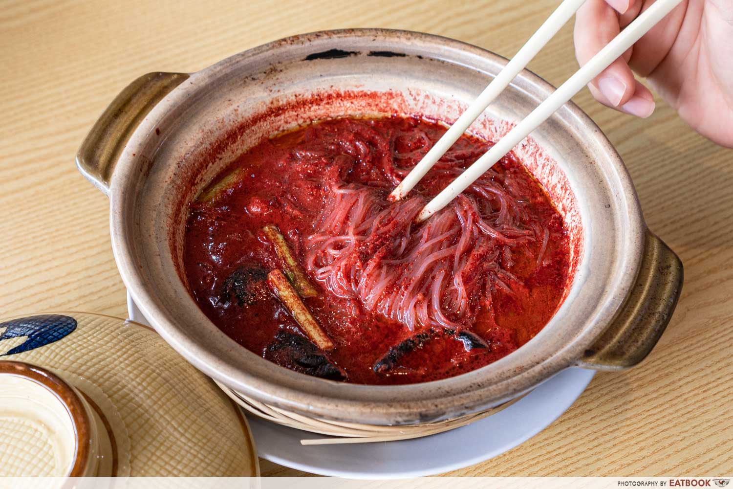 Lee Do Restaurant - Claypot Red Wine Chicken Soup flatlay